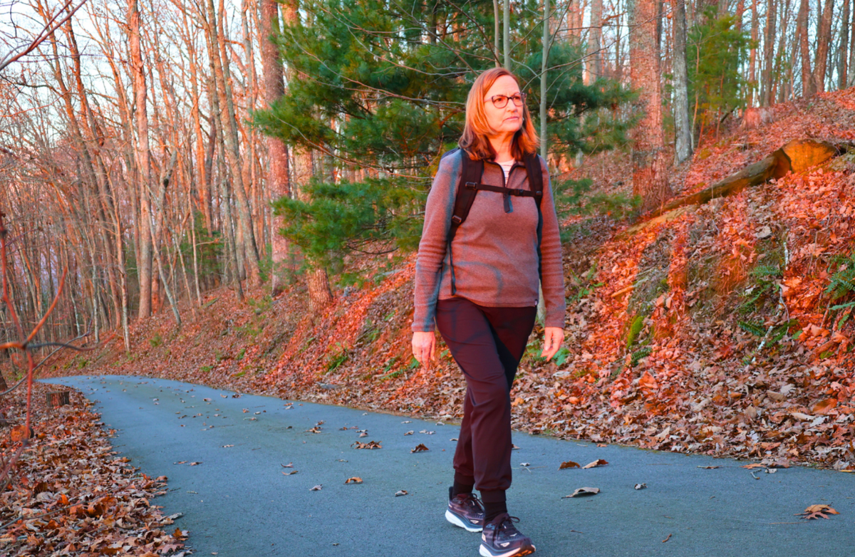 Walking with a weighted backpack on a neighbourhood path